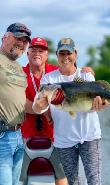 Guide Jake Card with guests and trophy bass